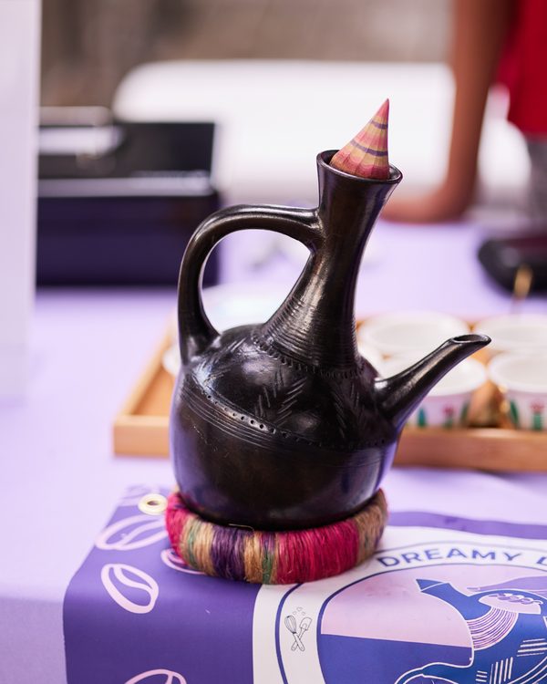 A traditional Ethiopian jebena, the clay pot used to brew coffee, on the Dreamy Drip table